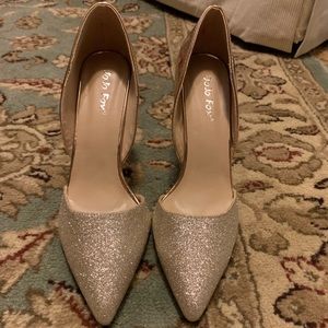 JoJo Fox rose gold metallic heels.